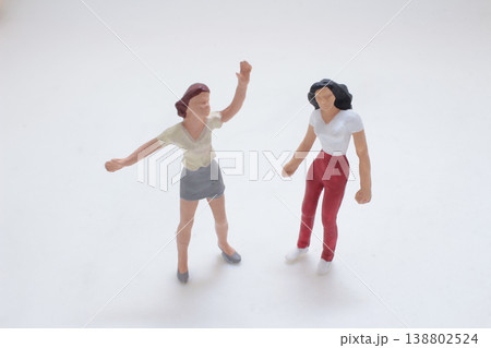 Miniature Figures In Playful Dancing Interaction Miniature Figures In Playful Dancing Interaction 138802524