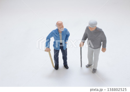 Miniature Elderly Figures Standing With Walking Canes 138802525