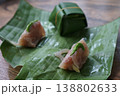 Authentic Thai Naem Moo or fermented pork sausage in selective focus. wrapped in banana leaf 138802633