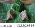 Authentic Thai Naem Moo or fermented pork sausage wrapped in banana leaf 138802636