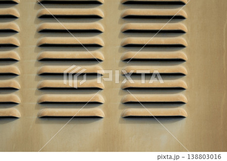 Industrial vent grid pattern close up beige metal texture abstract background modern architectural detail Industrial vent grid pattern close up beige metal texture abstract background modern architectural detail 138803016