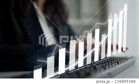 Professional Business Person Analyzing Financial Data Trends Using Data Visualization on Keyboard with Graph Representation of Growth Copula Professional Business Person Analyzing Financial Data Trends Using Data Visualization on Keyboard with Graph Representation of Growth Copula 138805398