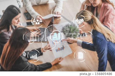 Women Collaborating on Artificial Intelligence Project with Data Visualization and Modern Technology Elements in Office Setting Quark Women Collaborating on Artificial Intelligence Project with Data Visualization and Modern Technology Elements in Office Setting Quark 138805486