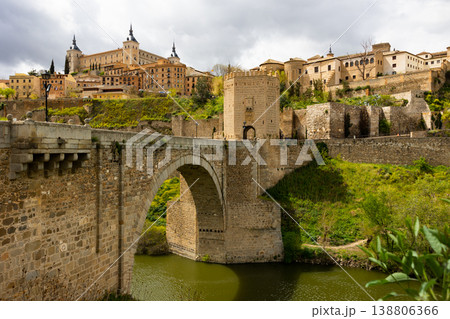 Landscape with a view of the Alcantara Bridge and the Alcazar de Toledo Castle Landscape with a view of the Alcantara Bridge and the Alcazar de Toledo Castle 138806366