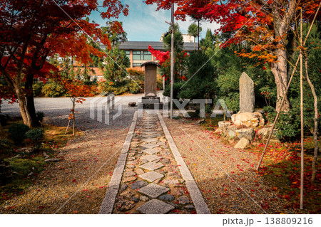 Nov 24 2025 Zen temple main hall framed by seasonal garden windows Nov 24 2025 Zen temple main hall framed by seasonal garden windows 138809216
