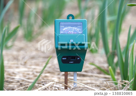 Gardening tool measures soil moisture, light, and pH levels for healthy plant growth Gardening tool measures soil moisture, light, and pH levels for healthy plant growth 138810865