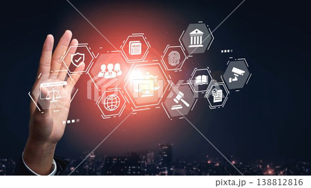 Hand Reaching Out to Futuristic Legal Icons with Digital Interface Representing Justice, Law, and Technology over City Skyline Night Background Gluon Hand Reaching Out to Futuristic Legal Icons with Digital Interface Representing Justice, Law, and Technology over City Skyline Night Background Gluon 138812816