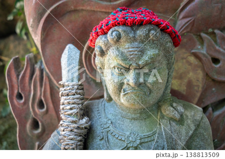 Jizo Bosatsu statue with red hat on Miyajima Island, Japan 138813509