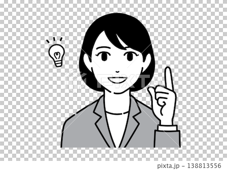 A young woman in a suit smiles and points; employee 138813556