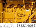 Close-Up of Vintage Tractor Engine in Yellow Industrial Detail 138814065