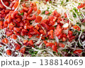 Fresh Mixed Salad with Chopped Tomatoes and Herbs Close-Up 138814069