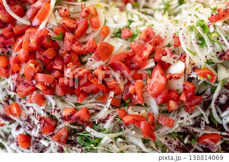 Fresh Mixed Salad with Chopped Tomatoes and Herbs Close-Up 138814069