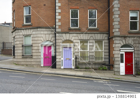 the brightly colored entrance doors to a building in Dublin, Ireland 138814901