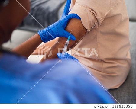 Hands, nurse and needle for arm vaccine, medical and healthcare treatment for virus safety, flu and home wellness. Patient, doctor and person with injection syringe for medicine, covid and vitamin Hands, nurse and needle for arm vaccine, medical and healthcare treatment for virus safety, flu and home wellness. Patient, doctor and person with injection syringe for medicine, covid and vitamin 138815350