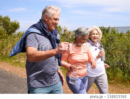 Senior friends, running and nature on street, fitness and happy for training, diversity and wellness in summer. Man, women and outdoor for workout, exercise or conversation with energy in countryside 138815392