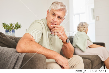 Senior man, fight and thinking of divorce, breakup and stress of sad separation on sofa at home. Frustrated couple on couch in conflict, crisis and problem of drama, bad marriage or emotional anxiety Senior man, fight and thinking of divorce, breakup and stress of sad separation on sofa at home. Frustrated couple on couch in conflict, crisis and problem of drama, bad marriage or emotional anxiety 138815441