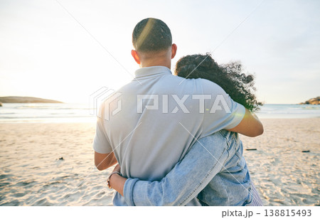 Couple hug, back and beach, ocean and travel with bond and love, trust and marriage outdoor. Adventure, tropical holiday and view of sea waves, man and woman with loyalty and life partner in nature 138815493