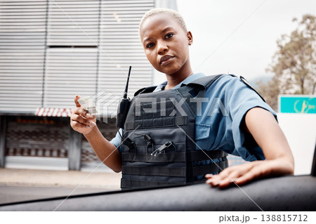 Portrait, drivers license or police officer in city to check info for law enforcement, protection or street safety. Black woman, traffic stop or cop on security patrol for road block or crime justice Portrait, drivers license or police officer in city to check info for law enforcement, protection or street safety. Black woman, traffic stop or cop on security patrol for road block or crime justice 138815712