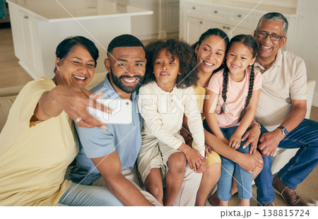 Family selfie, grandparents and kids on sofa with social media or online memory for bond, love and happy home. Senior mom, dad and biracial children in living room for photography or profile picture Family selfie, grandparents and kids on sofa with social media or online memory for bond, love and happy home. Senior mom, dad and biracial children in living room for photography or profile picture 138815724