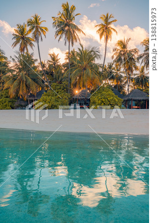 Breathtaking tropical island sunset palm trees calm ocean water serene summer beach paradise travel scenic nature background Breathtaking tropical island sunset palm trees calm ocean water serene summer beach paradise travel scenic nature background 138815973