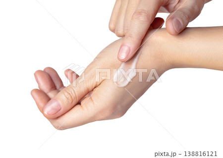 Woman hands with a white swatch with a smear of cream. Beautiful care concept, skin care, hand care, facial care. Isolated on white background photo close up Woman hands with a white swatch with a smear of cream. Beautiful care concept, skin care, hand care, facial care. Isolated on white background photo close up 138816121