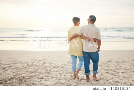 Senior couple hug, back and beach, ocean and travel with bonding and love, trust and marriage outdoor. Adventure, tropical holiday and waves, man and woman with loyalty and life partner in nature 138816154