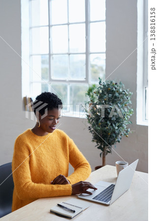 Remote work from home, business and black woman with a laptop, typing and deadline with happiness, connection and internet search. Female person, lady or entrepreneur with a pc or website information Remote work from home, business and black woman with a laptop, typing and deadline with happiness, connection and internet search. Female person, lady or entrepreneur with a pc or website information 138816158