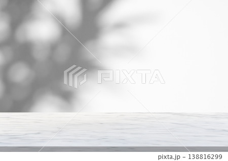 Marble table with tree shadow drop on white wall background for mockup product display Marble table with tree shadow drop on white wall background for mockup product display 138816299