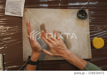 Hands Shaping Clay in Pottery Craft Session Hands Shaping Clay in Pottery Craft Session 138816472