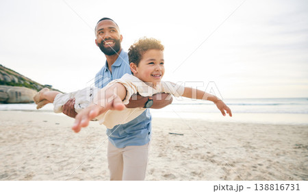 Love, airplane and father with child at the beach with freedom, smile and bonding in nature together. Happy, flying and parent with boy kid at the sea for fun, games and freedom, holiday or trip 138816731