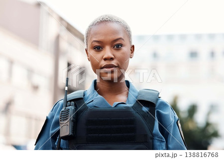 Portrait, police or black woman in city for law enforcement, community protection or legal street safety. Cop, supervisor or serious female security guard on patrol in urban town for crime or justice Portrait, police or black woman in city for law enforcement, community protection or legal street safety. Cop, supervisor or serious female security guard on patrol in urban town for crime or justice 138816768