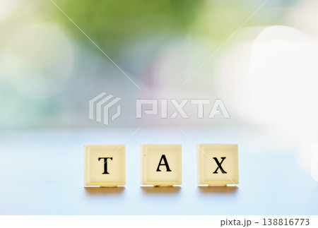 Tax, word or message on wood blocks or letters writing on financial, report or management of money on a bokeh background space. Accounting mockup, planning for finance or taxes on audit in the future Tax, word or message on wood blocks or letters writing on financial, report or management of money on a bokeh background space. Accounting mockup, planning for finance or taxes on audit in the future 138816773