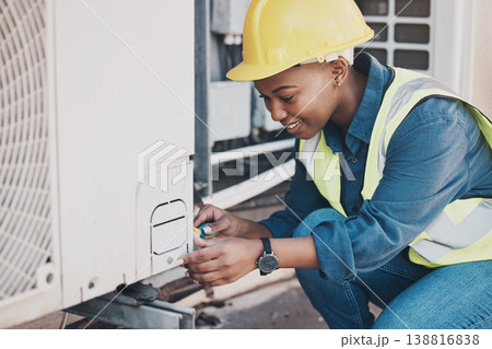 Happy black woman, technician and building installation for air control, construction or vent on roof. African female person, contractor or engineer installing industrial equipment for architecture Happy black woman, technician and building installation for air control, construction or vent on roof. African female person, contractor or engineer installing industrial equipment for architecture 138816838