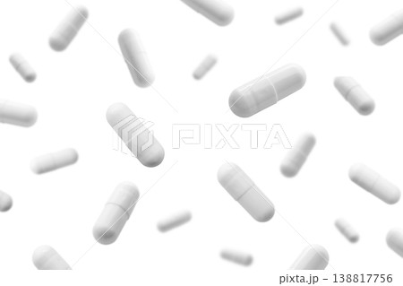 Falling white medicine pills capsule isolated on white background Falling white medicine pills capsule isolated on white background 138817756