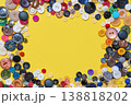 Colorful button border frame with copy space on yellow background 138818202