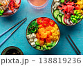 Poke bowl assortment. Rice with salmon, shrimps, and grapefruit, overhead shot 138819236