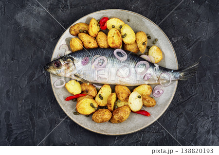 Plate with salted herring and baked potatoes Plate with salted herring and baked potatoes 138820193