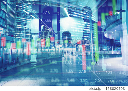 City finance scene shows people walking past large buildings with stock market data overlay on a busy city street in the evening City finance scene shows people walking past large buildings with stock market data overlay on a busy city street in the evening 138820308