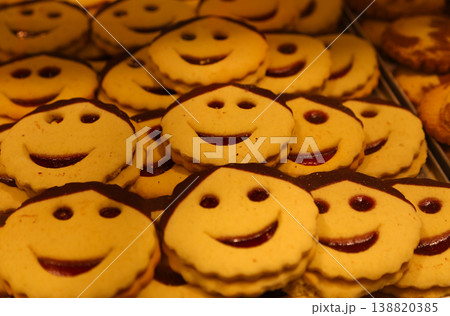 A large batch of homemade cookies in the form of emoticons with chocolate A large batch of homemade cookies in the form of emoticons with chocolate 138820385