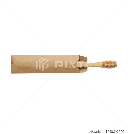 Eco-friendly bamboo toothbrush in minimalist brown packaging, representing conscious dental routine and plastic-free living. 138820691