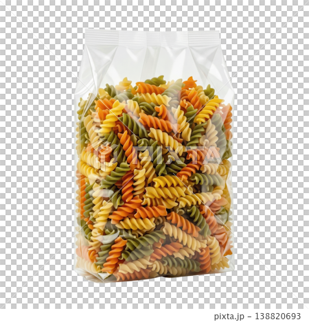 Uncooked tricolor spiral pasta in transparent packaging, isolated studio shot. Healthy Italian food. 138820693