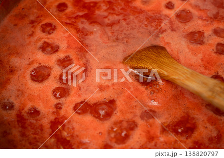 Close up of a Natural tomato sauce boiling in pot Close up of a Natural tomato sauce boiling in pot 138820797