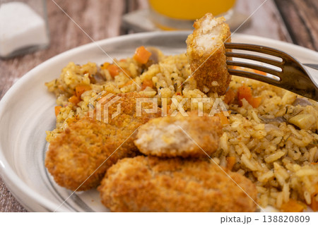 Homemade Rice with Crispy Fish and Herbs Homemade Rice with Crispy Fish and Herbs 138820809
