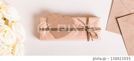Gift box, heart and roses for Mother's Day on the table top view web banner Gift box, heart and roses for Mother's Day on the table top view web banner 138821035
