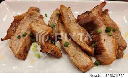 Delicious Grilled Pork Neck Slices with Green Onions on White Plate - Asian Style Delicious Grilled Pork Neck Slices with Green Onions on White Plate - Asian Style 138821732