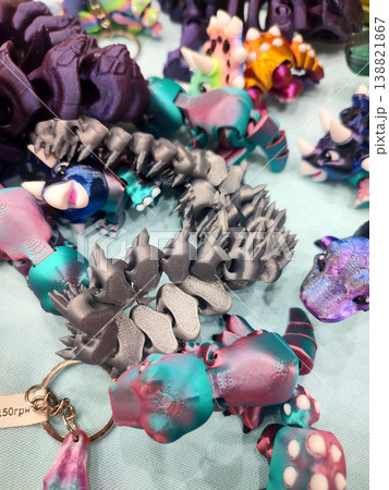 3D printed different art objects. Objects printed on 3D printer from melted colored plastic. Multicolored models created on 3D printer from threads of molten plastic. Modern new additive technologies 138821867