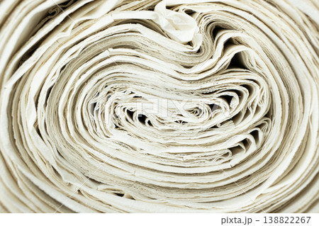 Macro texture of white recycled paper spiral 138822267