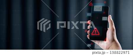 Hand holding a smartphone with red warning alert icons and email symbols, illustrating mobile cyber security threats, data breaches, and phishing attacks in a digital environment Hand holding a smartphone with red warning alert icons and email symbols, illustrating mobile cyber security threats, data breaches, and phishing attacks in a digital environment 138822971