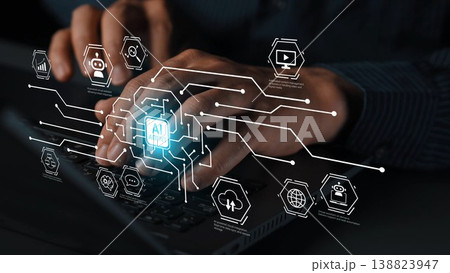 Hands Typing on a Laptop with AI Themed Digital Interface and Technology Visualization in a Dark Environment Gluon Hands Typing on a Laptop with AI Themed Digital Interface and Technology Visualization in a Dark Environment Gluon 138823947