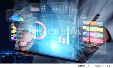 A professional analyzing data analytics on a digital tablet, showcasing futuristic graphs and statistics that highlight performance metrics and business insights. Sigmoid 138824054